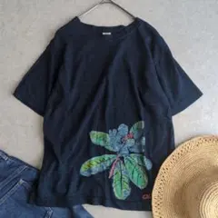 てるぼうさま　45R rpm インディゴ染め　アシンメトリー　花　ロゴ　Tシャツのサムネイル