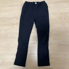 黒いスリムフィット長ズボン