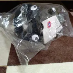 【新品お顔厳選！】黒ミャクミャク這い型S