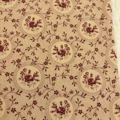 マーカス生地　明るめのベージュにレッドの柄