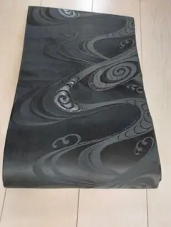 名古屋帯 黒色 渦巻き模様