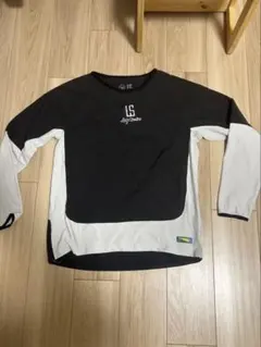 黒と白の長袖ピステ　ルースイソンブラ