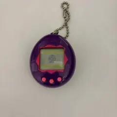 り*ぃ様 【動作確認済】初代 たまごっち 海外版 パープル×ピンク バンダイ 1