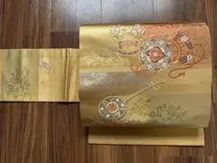 【123】名古屋帯　唐織　引箔　正絹　西陣織　楽器　中古のサムネイル