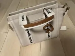 Kate Spade New Yorkキャンバス素材のトートバッグ