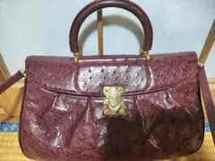 TAURUS バーガンディ ショルダーバッグ