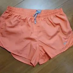 Nike オレンジ ランニングショーツ　レディース M