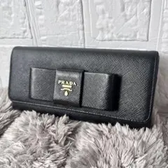 美品✨PRADA サフィアーノ 長財布 フィオッコ リボン フラップ グレー