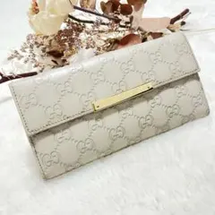 GUCCI マイクロシマ リボン シャンパンゴールド 長財布 - メルカリ