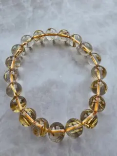 証明書付き希少ボリビア産虹入りシャラ針上品ゴールドルチルクォーツブレス12ミリ 証明書付き希少ボリビア産虹入りシャラ針上品ゴールドルチル