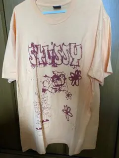 Stussy グラフィックTシャツ Lサイズ オレンジ
