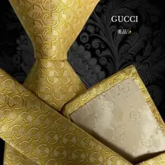 GUCCI ネクタイ Gロゴ柄 光沢 ゴールド パターン柄
