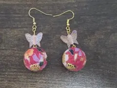 ハンドメイド ピンク蝶ピアス