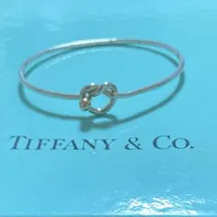 美品 TIFFANY ティファニー SVxK18コンビ ラブノット バングル - メルカリ