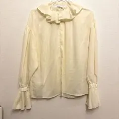 COEL フリル付きブラウス クリーム色のサムネイル