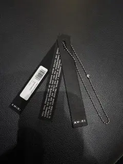 【5セット】AMIRI タグ 3連タグ レザー 紙 ボールチェーン 正規品】AMIRI タグ 3連タグ レザー 紙 ボールチェーン - メルカリ