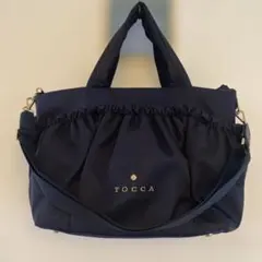 tocca リボン トートバッグ 美品 ネイビー - メルカリ
