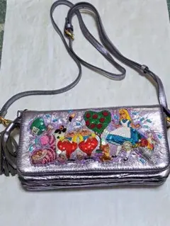 お決まりです。新品タマオワールドディズニーショルダーバッグおまけ付き