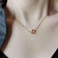 ハート型　リング交差　ネックレス