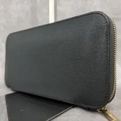【良品✨】ヴァレクストラ ラウンドファスナー 長財布 レザー 本革 グレー系のサムネイル