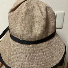 ベージュ ストローバケットハット 黒リボン
