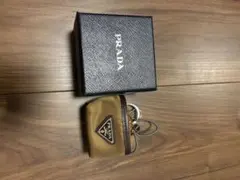 PRADA AirPods Pro イヤフォンケース チャーム 黒 - メルカリ