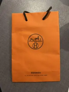 HERMES オレンジ ロゴ入り紙袋