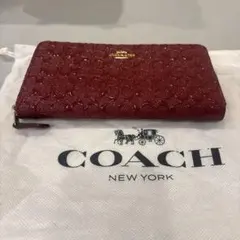 コーチ　長財布　赤　ワインレッド　エンボス加工　ラメ　シグネチャー