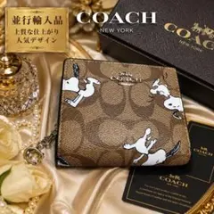 COACH PEANUTS 二つ折り財布 スヌーピーCE708 SV/BN - メルカリ