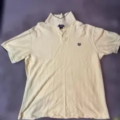 CHAMPSロゴ付きクリーム色ポロシャツ