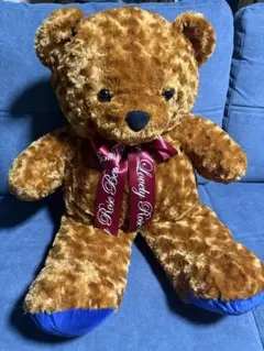 大きな茶色のクマのぬいぐるみ