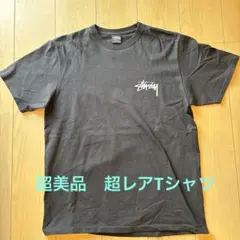 Stüssy ブラックプリントTシャツ