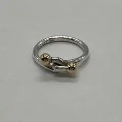 ティファニー TIFFANY&CO ラブノット バングル SV YG コンビ - メルカリ