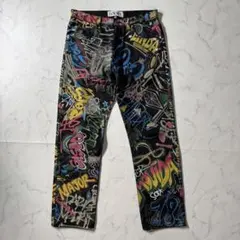 【美品】ロエベ　グラフィティデニムパンツ　総柄　ロゴ刻印ボタン　レザーパッチ　Lのサムネイル