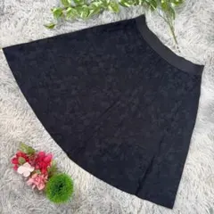 ✨PUPULA✨サイズ40(L) 黒いフレアスカート 花柄テクスチャーのサムネイル