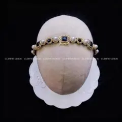 エレガントな金色ヘアバンド