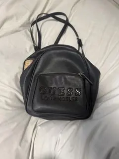 GUESS ミニリュック ブラック ロゴ入り - メルカリ