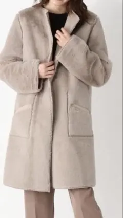 新品タグ付　グローブ　リバーシブルノーカラーフェイクムートンコートサイズＬ