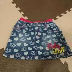 110 美品 ベビードール ３段フリルデニムスカート 総ロゴ刺繍