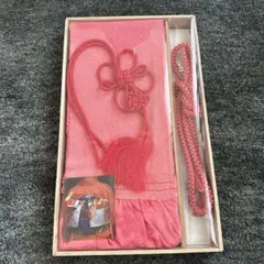 ピンク系の帯揚げ 花結び付き