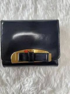 PRADA プラダ 二つ折り財布 リボン パテントレザー ブラック ゴールド金具のサムネイル