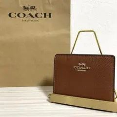 【新品未使用タグ付】COACH 二つ折り財布 ブラウン アウトレット