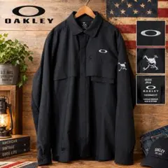 OAKLEY デザイン　スナップボタン　長袖シャツ ブラック　ゴルフシャツ
