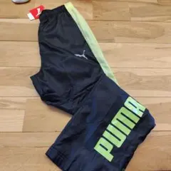 PUMA 黒/黄緑 ジャージパンツ
