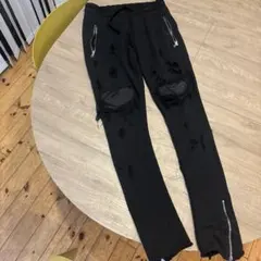 アミリ ダメージ加工 ブラック スウェットパンツ