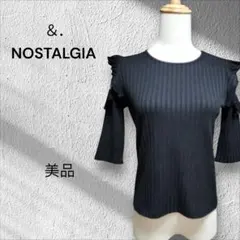 美品NOSTALGIA ブラックリブトップス 五分袖レーヨン混