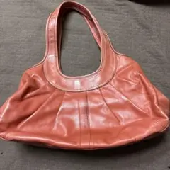 COACH オレンジ レザー ハンドバッグ
