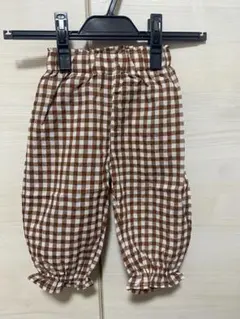 茶色と白のチェック柄フリルパンツ