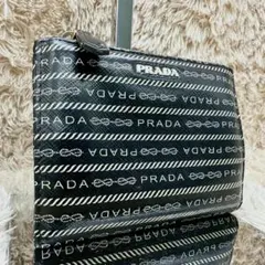 【美品】プラダ 二つ折り財布 総柄 サフィアーノ レザー ブラックのサムネイル