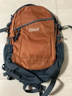 Colemanリュック　オレンジ　グリーン　多機能　袋つき